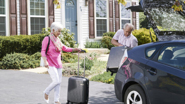 Ladywithluggagebycar